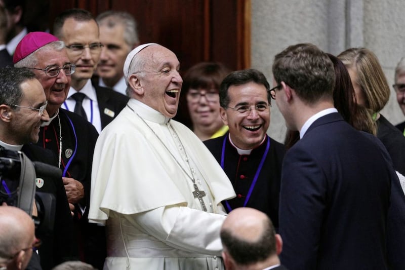 Pope Francis shares a joke as he leaves St Mary&#39;s Pro Cathedral in Dublin during his visit to Ireland for the World Meeting of Families in August 2018. Picture by Aaron Chown/PA Wire 