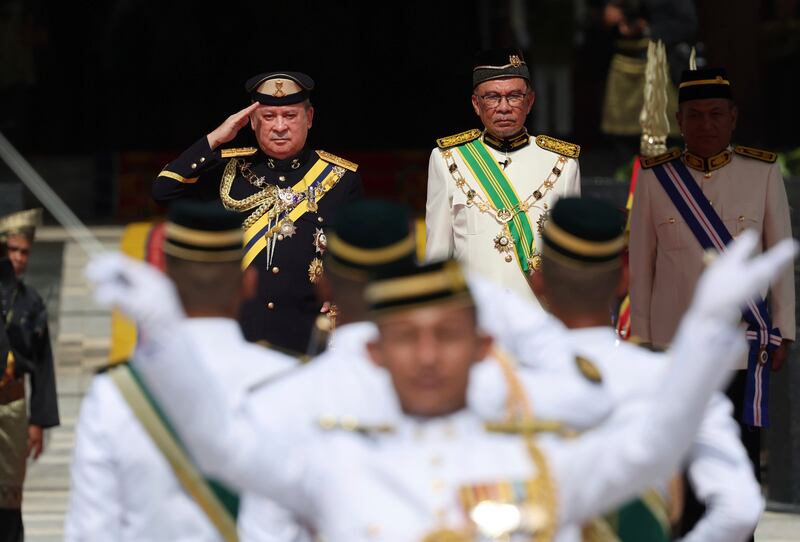 Malaysia’s Prime Minister Anwar Ibrahim was alongside the new monarch at the ceremony (Pool via AP)