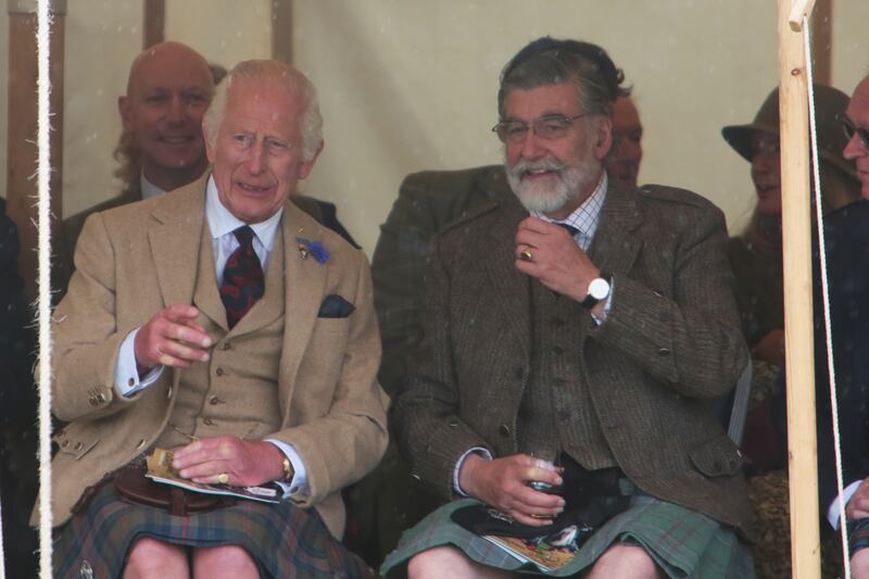 The King sat with officials from the games