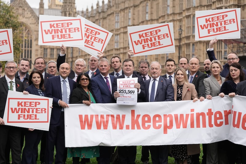 Mel Stride (centre) and other Conservative MPs call for the Government to stop the planned cuts to the winter fuel payment