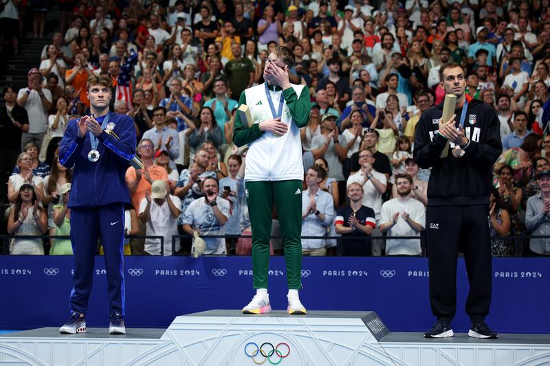 Daniel Wiffen on the podium and almost in tears after receiving the gold medal. (Photo by Adam Pretty/Getty Images)