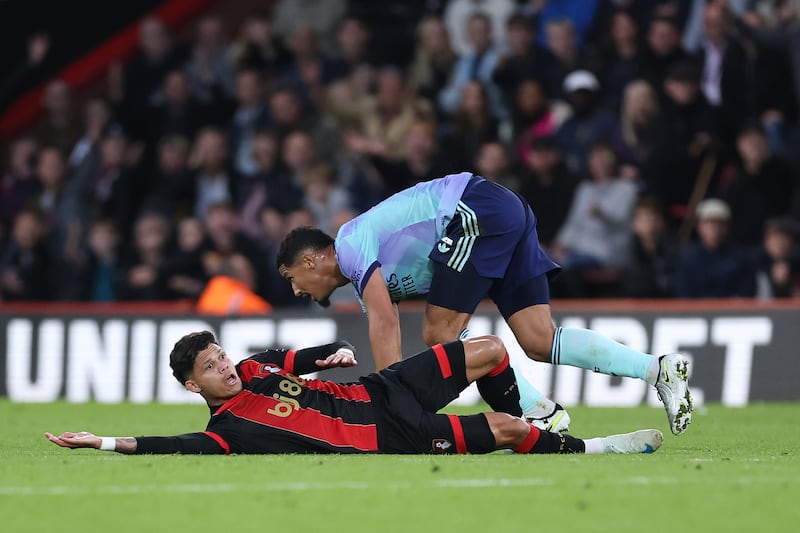 William Saliba was dismissed after 30 minutes for fouling Evanilson