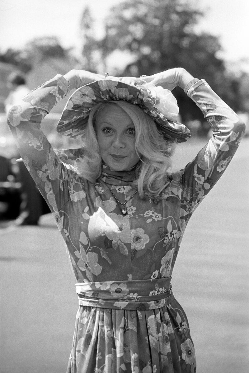 Actress Linda Cunningham wore a floral blue dress and matching hat in 1978