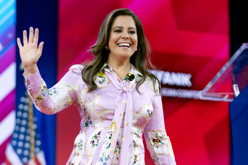 Elise Stefanik waves to supporters at CPAC in Oxon Hill, Maryland (Jose Luis Magana/AP)