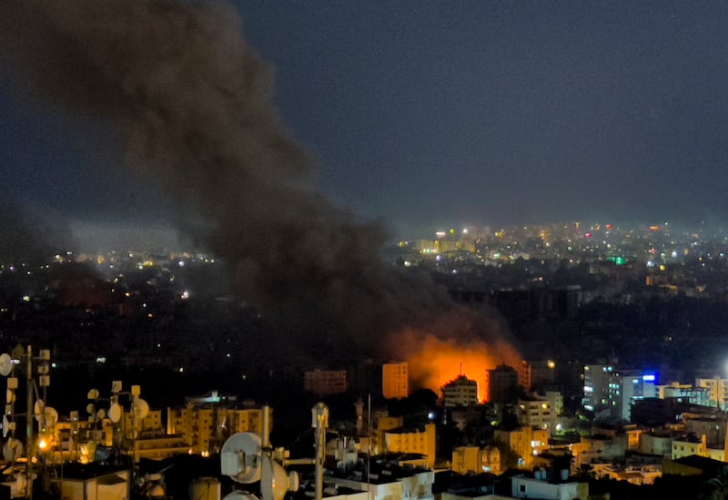 Flames and smoke rise from Israeli air strikes in Dahiyeh, Beirut, Lebanon (Hussein Malla/AP)