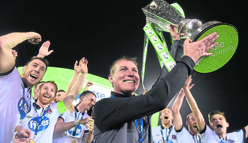 Dundalk manager Stephen Kenny celebrates with the trophy after the game winning the SSE Airtricity League Premier Division