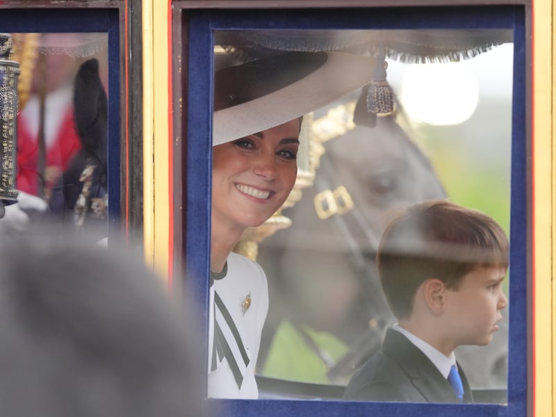 Kate and Louis travel along The Mall to the Trooping the Colour ceremony in June