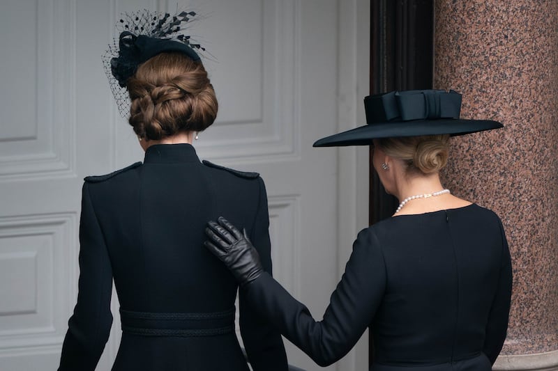 The Princess of Wales (left) and Duchess of Edinburgh leave the balcony at the Foreign Office on Remembrance Sunday