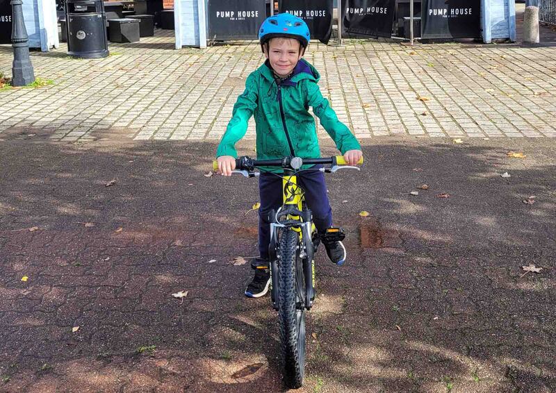 Elliott Evans took part in a sponsored bike ride to raise funds for the hospital which cared for him after he banged his head (Swansea Bay University Health Board/PA)