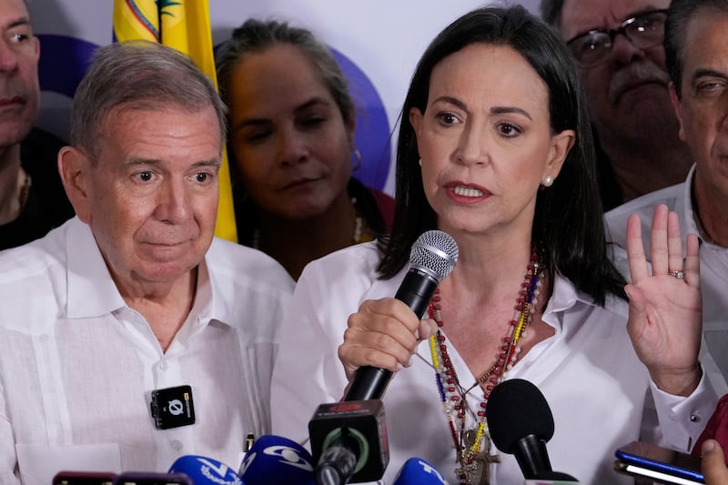 Opposition leader Maria Corina Machado, right, and presidential candidate Edmundo Gonzalez hold a press conference (Matias Delacroix/AP)