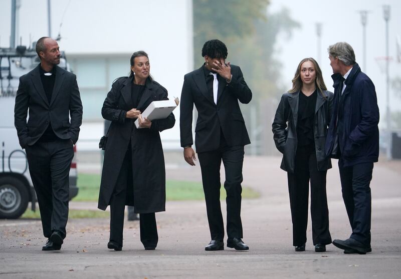 Sven-Goran Eriksson’s children Johan, left, and Lina, second left, among the mourners arriving for the former England manager’s funeral