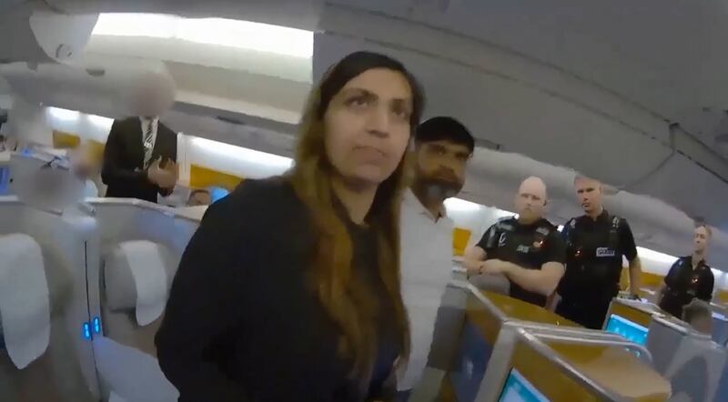 Screen grab from body cam footage of the moment police officers boarded a plane and detained Sara Sharif’s stepmother Beinash Batool