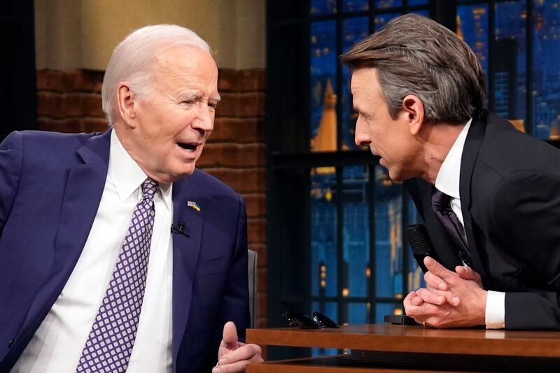 President Joe Biden talks with Seth Meyers during a taping of the Late Night with Seth Meyers (Evan Vucci/AP)