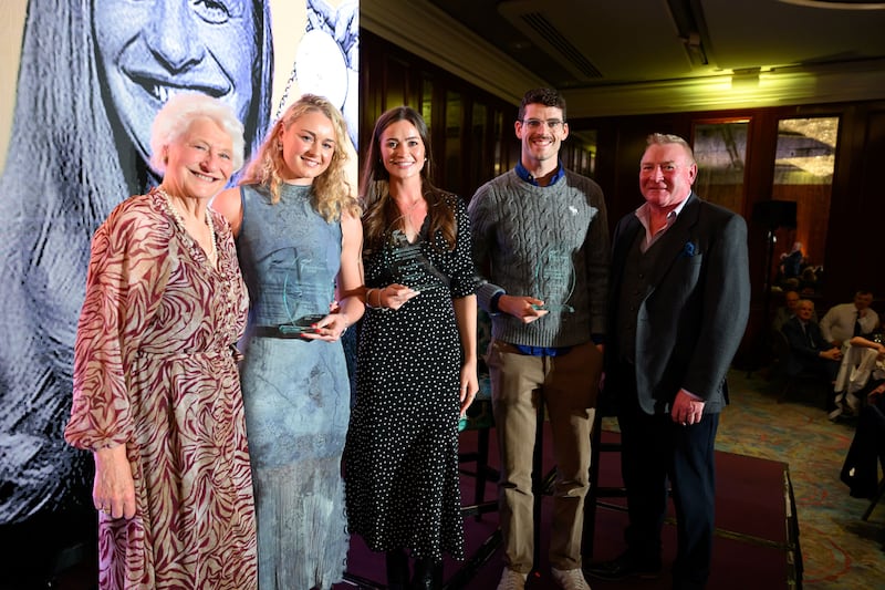 Olympic rowers and medallists Hannah Scott, Rebecca Shorten and Philip Doyle collect Mary Peters Trust international trophies, presented by Lady Mary Peters (left) and Jim Gracey, Trust Chair (right).