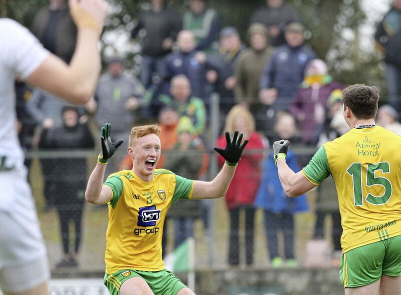 Oisin Gallen celebrates after Jamie Brennan (15) celebrates a goal against Kildare at Ballyshannon on Sunday.<br /> Picture Margaret McLaughlin.