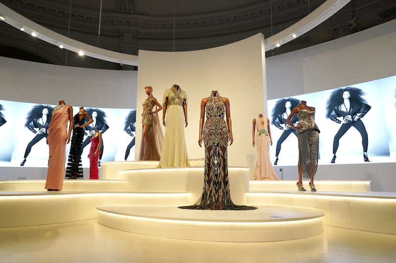 An array of dresses from Campbell’s own collection are on display at the exhibition