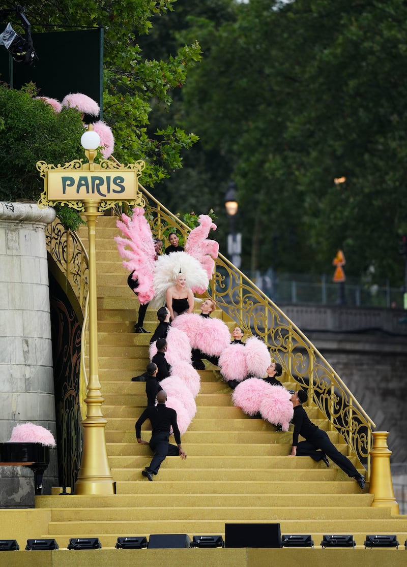 Lady Gaga rehearsing along the Seine