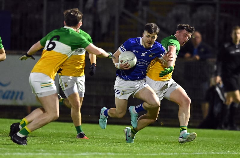 Ronan McNabb jnr of Dromore in action against  Cormac Munroe of Carrickmore in the Tyrone GAA Senior Championship 1st round at Heally Park, Omagh. Picture Oliver McVeigh