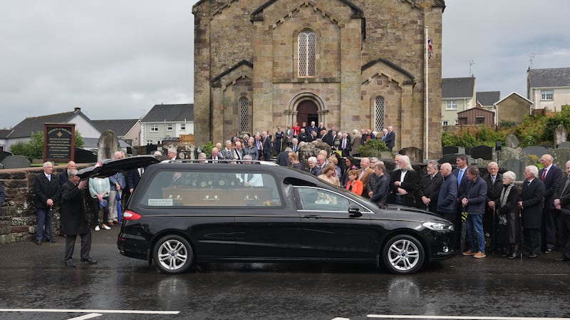 Mourners gathered in rain for Mehaffey’s committal service