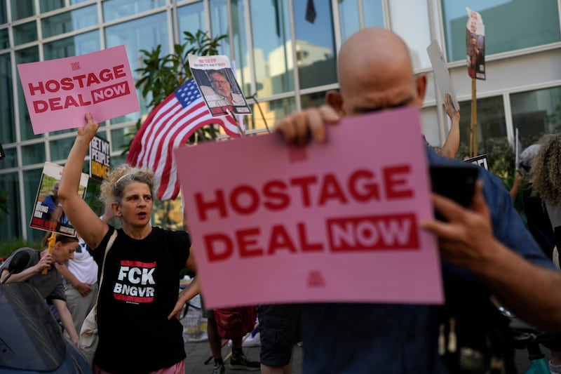 Israelis protest near the hotel where US Secretary of State Antony Blinken was staying in Tel Aviv (Ohad Zwigenberg/AP)