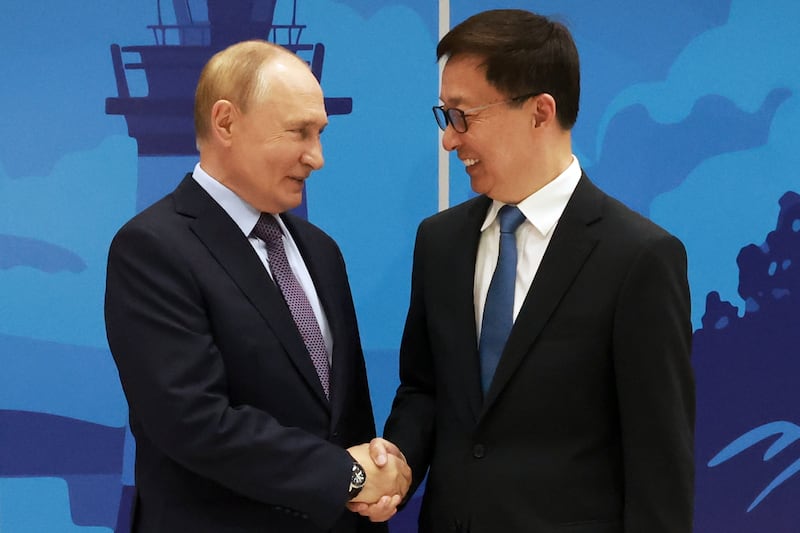 Russian President Vladimir Putin and China’s vice president Han Zheng shake hands during their meeting on the sidelines of the Eastern Economic Forum in Vladivostok, Russia, on September 4 (Vyacheslav Prokofyev, Sputnik, Kremlin Pool Photo via AP)