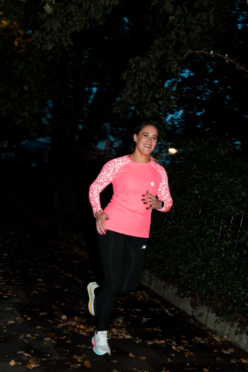 Sarah Campus wearing reflective running gear