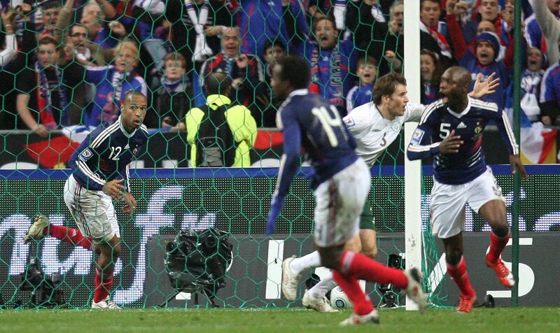 APOLOGETIC BUT FRENCH SAY 'NON' TO REPLAY: France's Thierry Henry (left) celebrates after setting up the winning goal during the FIFA World Cup Qualifying Play-Off against the Republic of Ireland at the Stade de France, Paris, France on Wednesday November 18, 2009. In the wake of the&nbsp; controversial goal French striker Henry yesterday said the &ldquo;fairest solution&rdquo; following his decisive handball incident (see video below) would be to replay the play-off. Henry set up the deciding goal for William Gallas by controlling the ball with his left hand in the 1-1 draw at the Stade de France. The goal in extra-time handed the French a place in next year&rsquo;s World Cup. But the France Football Federation (FFF) last night rejected calls from Irish striker Robbie Keane and the Football Association of Ireland for Wednesday&rsquo;s controversial World Cup qualifying play-off to be replayed. Picture by Martin Rickett/PA Wire..