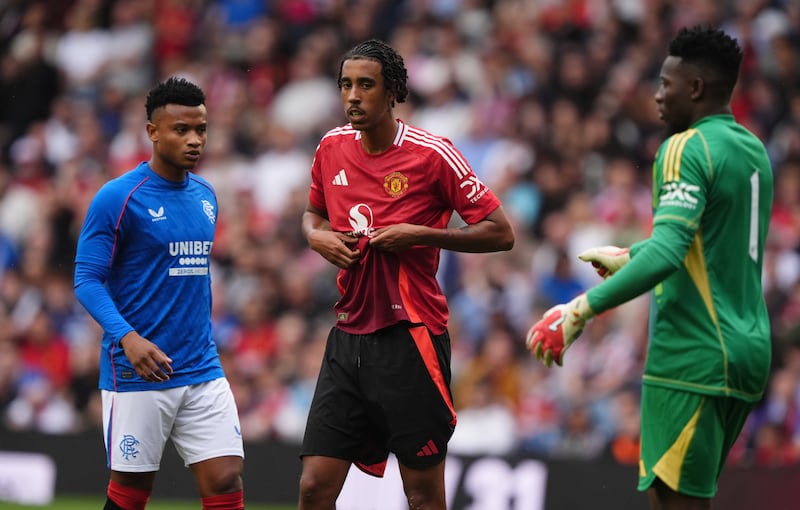 Leny Yoro (centre) got his first United outing against Rangers on Saturday