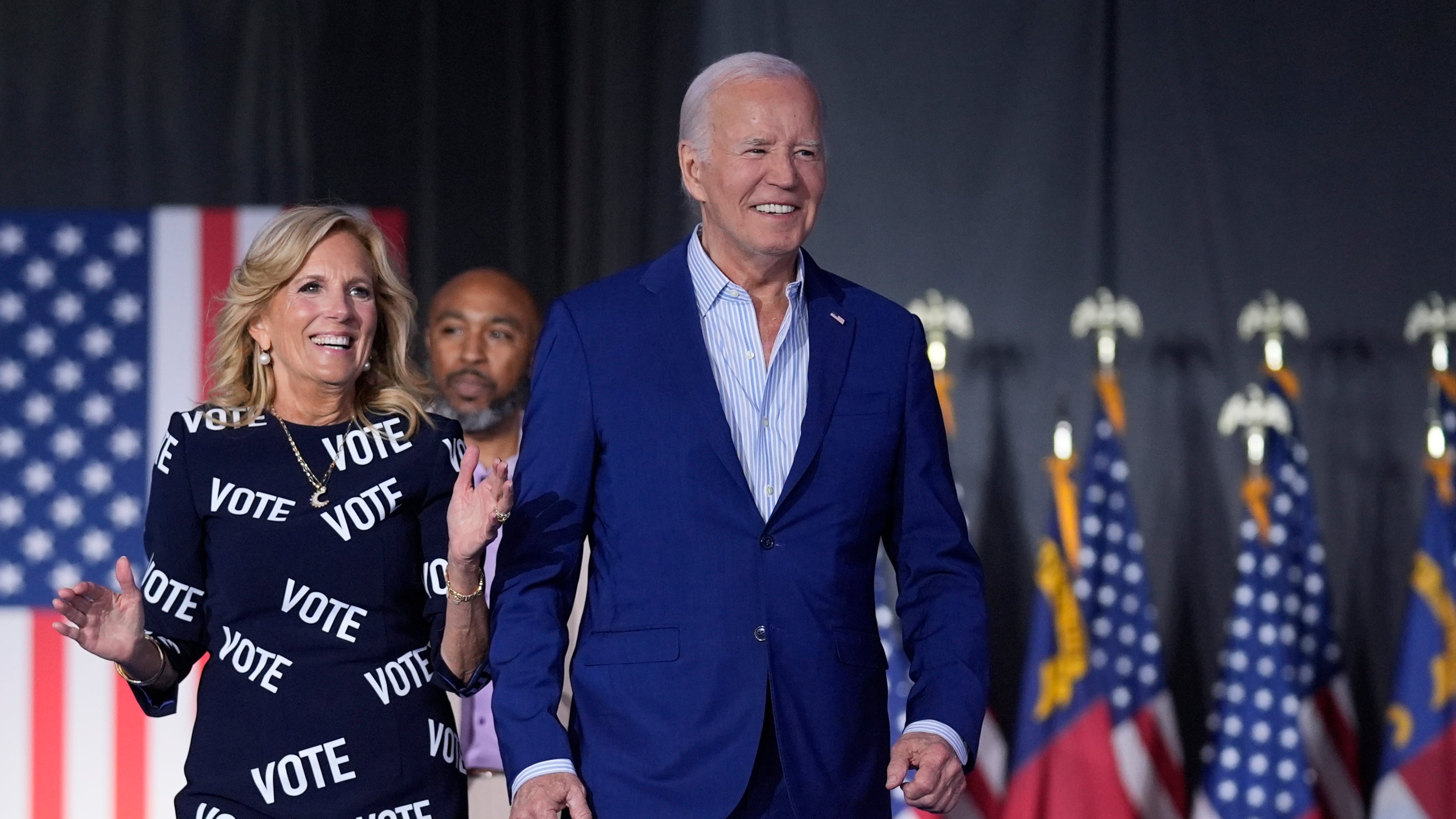 US President Joe Biden and first lady Jill Biden walk to the stage to speak at a campaign rally Raleigh, North Carolina (AP Photo/Evan Vucci)