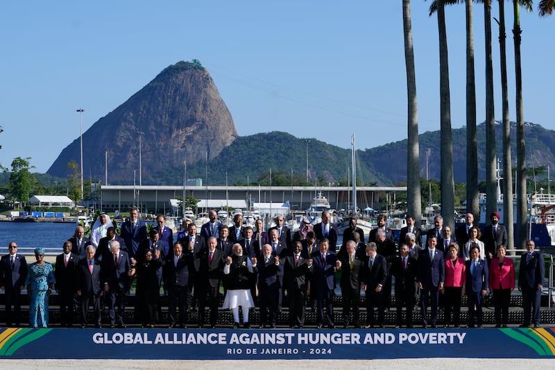 Leaders attending the G20 Summit pose for a group photo in Rio de Janeiro (Eraldo Peres/AP)