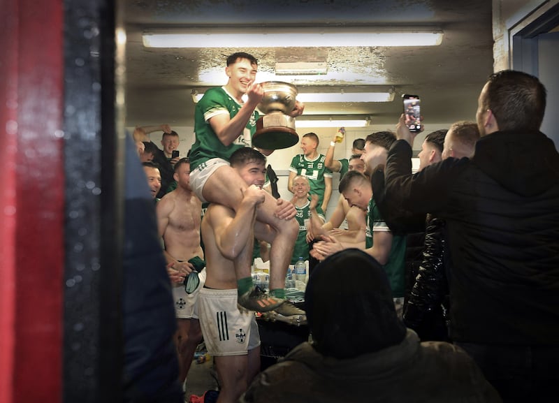 Newbridge players celebrate in the dressing room after their Derry SFC final win over Glen on Sunday
Picture: Margaret McLaughlin