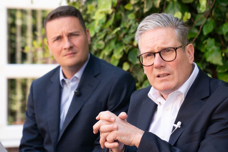 Wes Streeting, left, was appointed Health Secretary by Prime Minister Sir Keir Starmer, right, when Labour took office earlier this month