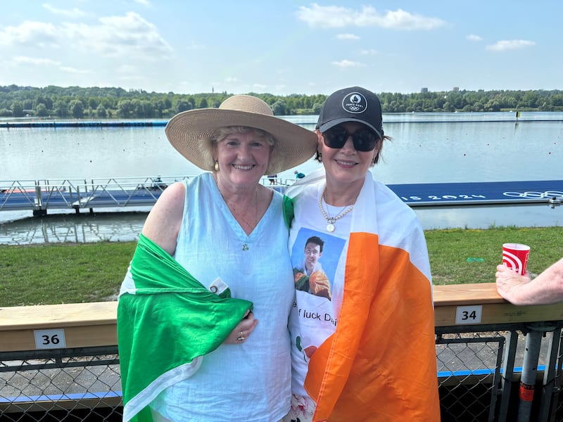 Una Doyle (left) and Joanna Lynch enjoy the moment after watching their sons win bronze medals in Paris