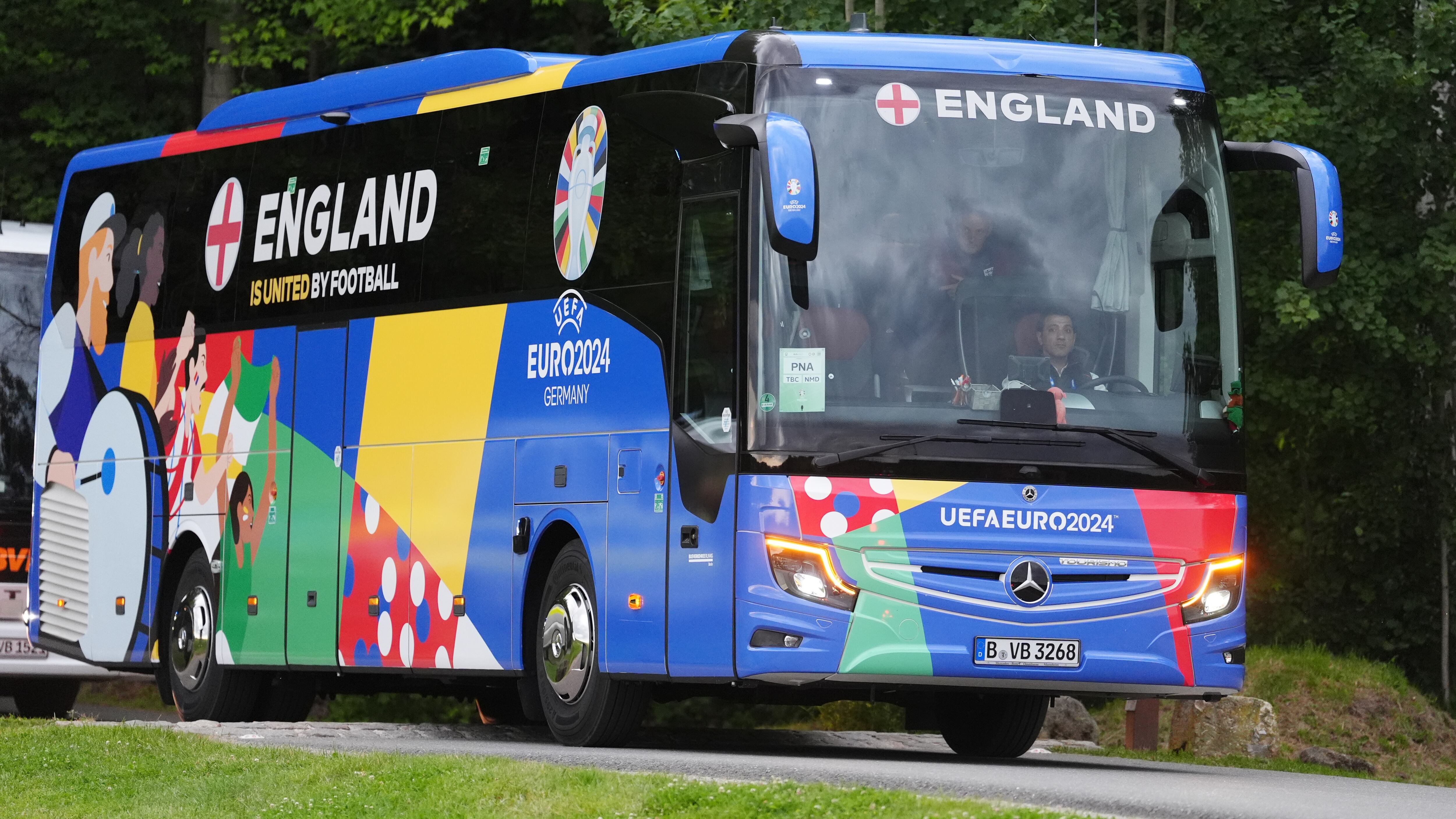 The England team bus arrives at their training base in Germany