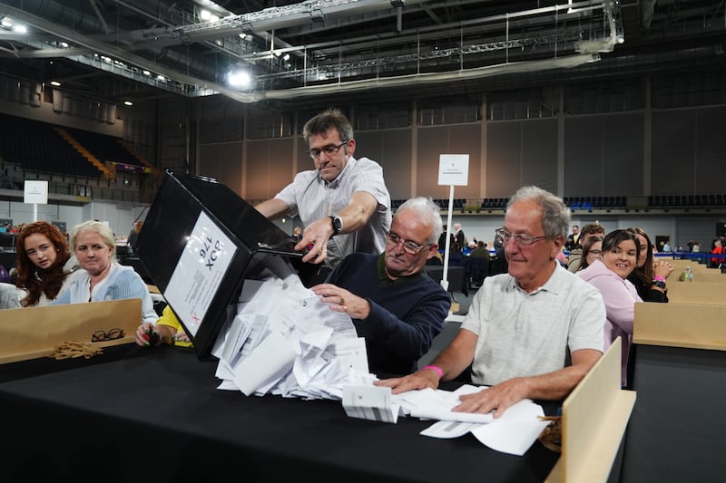 Ballot boxes are emptied at Emirates Arena in Glasgow, during the General Election count