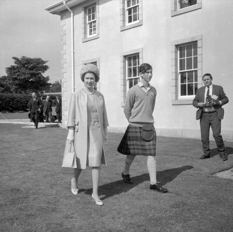 The late Queen at Gordonstoun School with Prince Charles