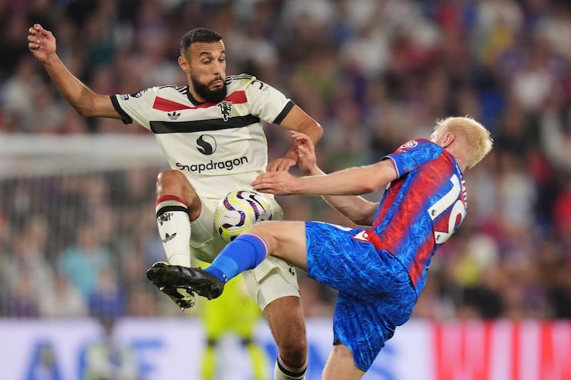 Noussair Mazraoui (left) joined Manchester United from Bayern Munich this summer