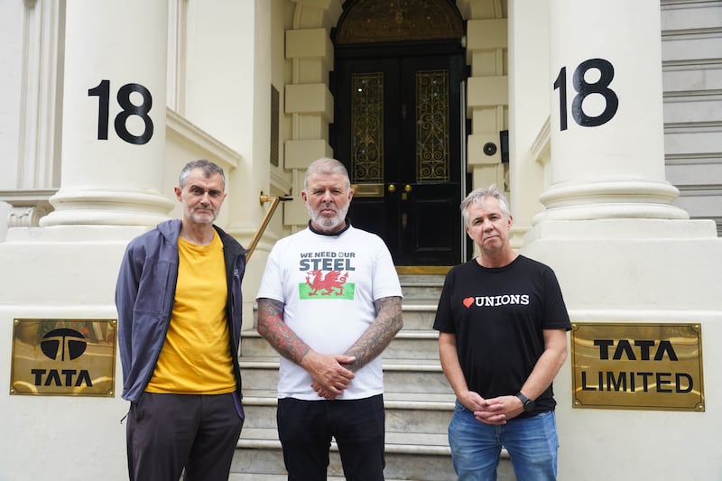 L-R: Paul Morozzo, Alun Davies and Stephen Smith from TUC at the action outside Tata Steel’s offices in London on Monday. (Kristian Buus/ Greenpeace)