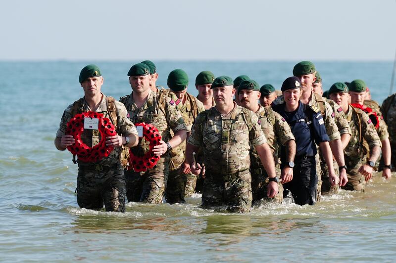 The beach landing by the Royal Marines of 47 Commando and civilians at Asnelles