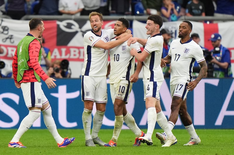 England’s Jude Bellingham celebrates with team-mates after scoring