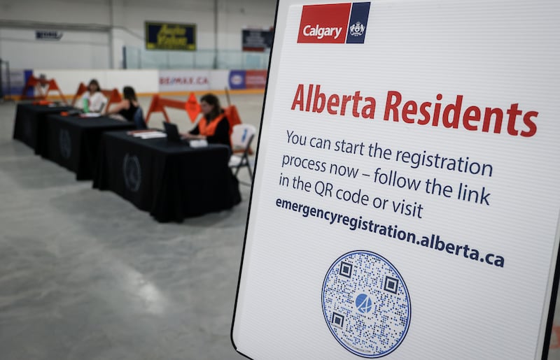 A reception centre is readied for wildfire evacuees forced from Jasper National Park (Jeff McIntosh/The Canadian Press via AP)