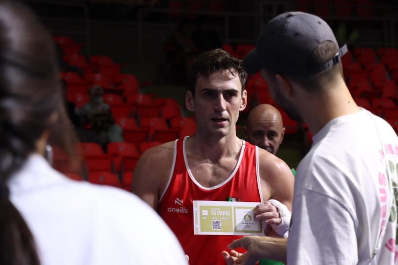 Aidan Walsh collects his Olympic ticket after sealing qualification for Paris in Bangkok on Sunday. Picture by Joe Walsh