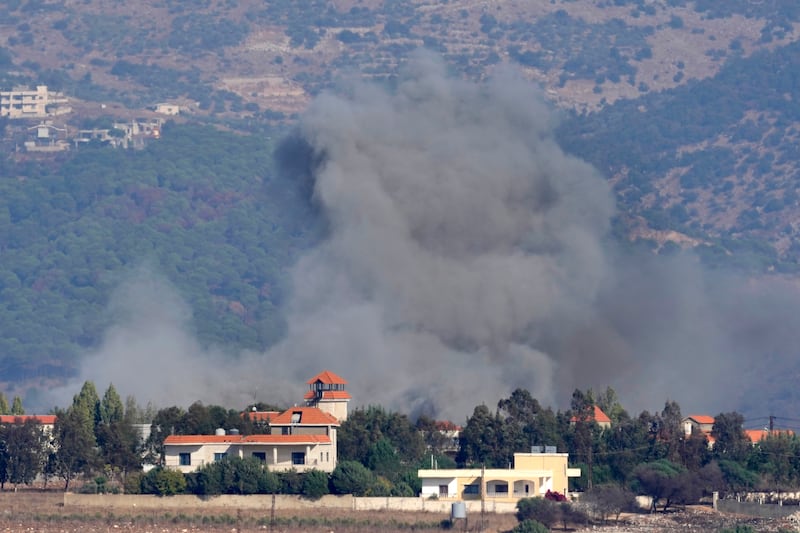 Smoke rises from an Israeli airstrike on the village of Khiam (Hussein Malla/AP)