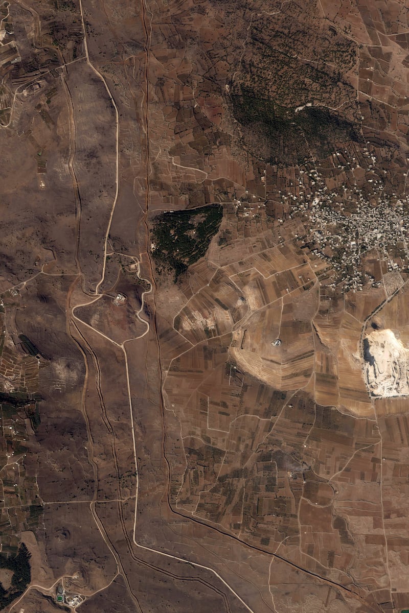 A satellite image showing Israeli work along the Alpha Line separating the Israeli-occupied Golan Heights from a demilitarised zone in Syria patrolled by UN forces (Planet Labs PBC/AP)