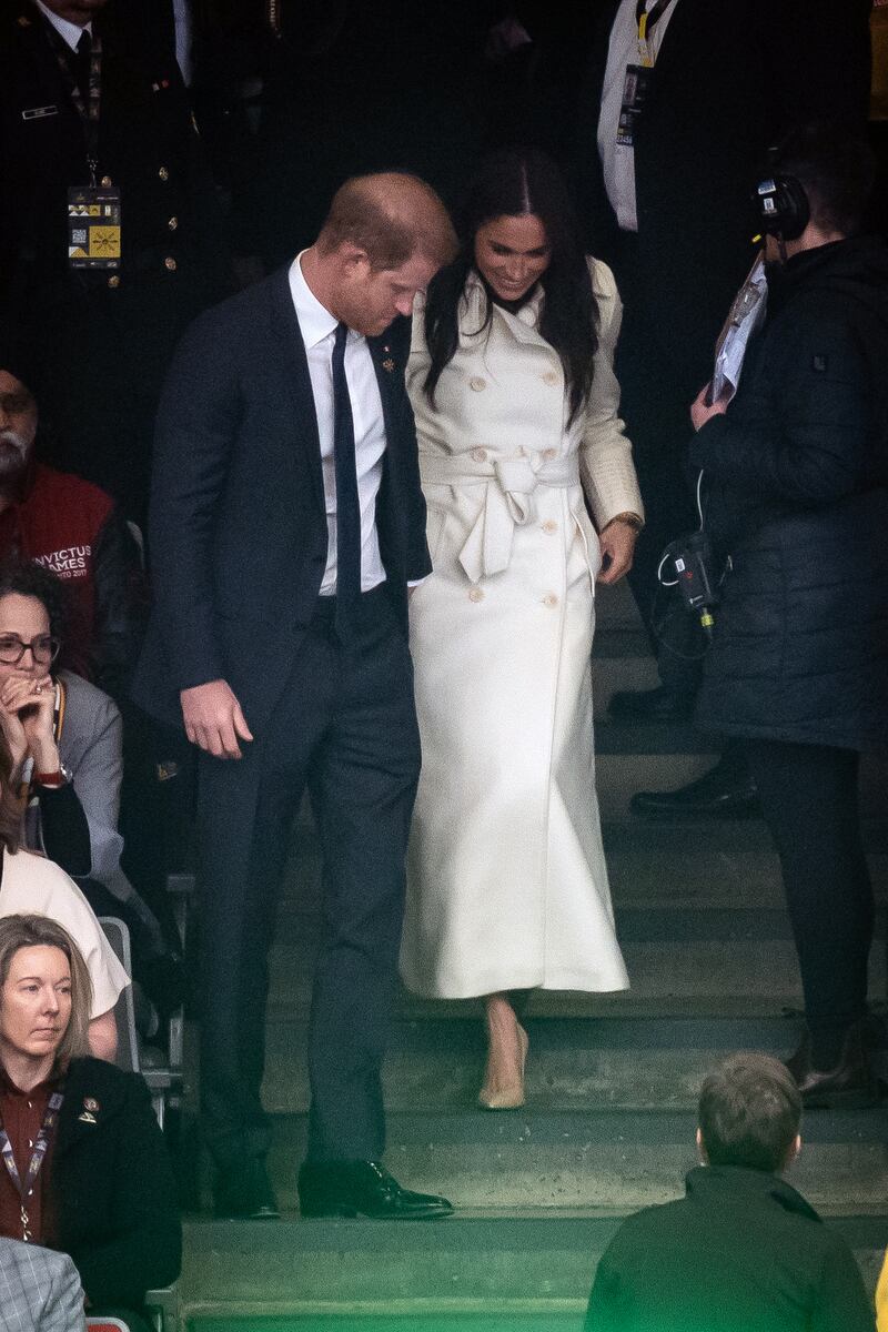 The Duke and Duchess of Sussex clapped as the national teams arrived for the opening ceremony of the Invictus Games