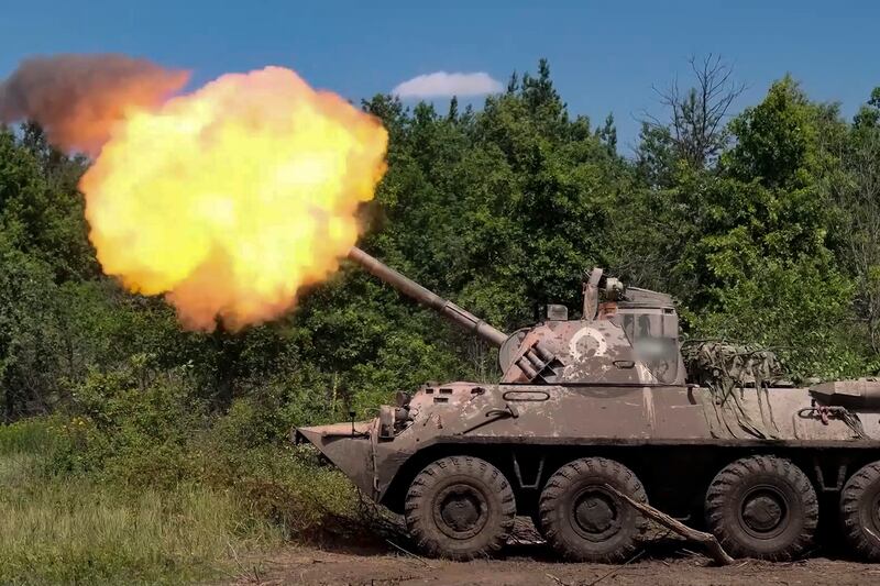 A Russian self-propelled mortar 2S23 Nona-SVK fires toward Ukrainian positions in an undisclosed location in Ukraine.(Russian Defence Ministry Press Service/AP)