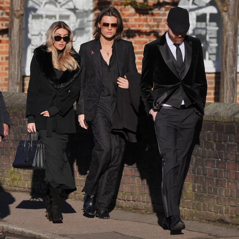 Kate Cassidy and Damian Hurley (centre) arrive for the funeral service of One Direction singer Liam Payne at St Mary’s Church in Amersham, Buckinghamshire