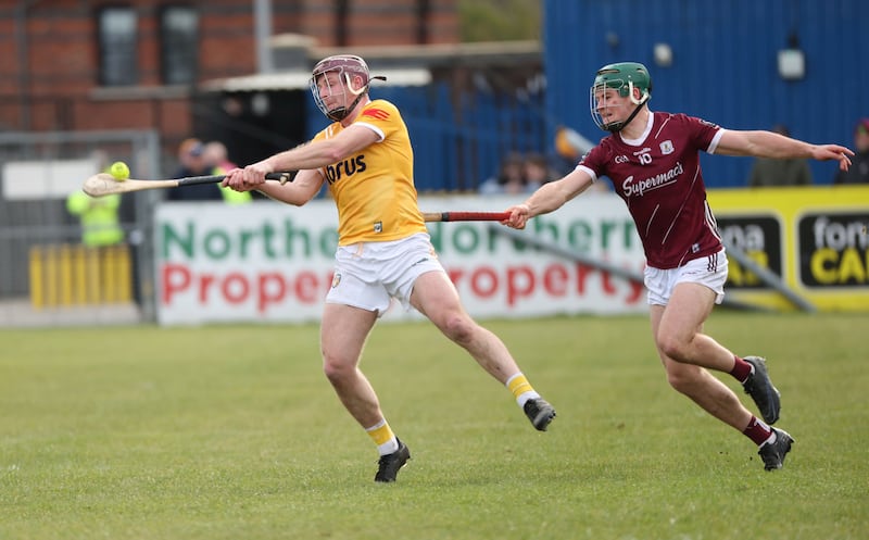 Eoghan Campbell fending off a Galway defender at Corrigan Park