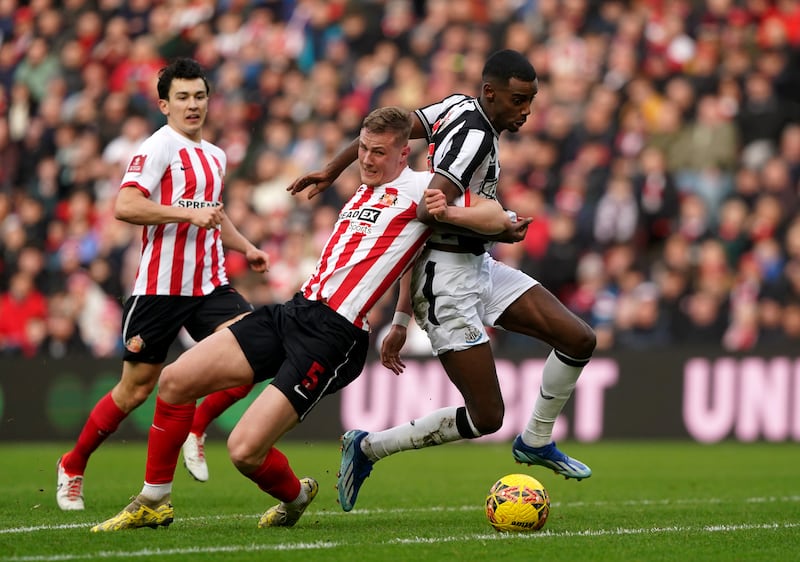 Daniel Ballard, left, and Newcastle’s Alexander Isak battle for the ball