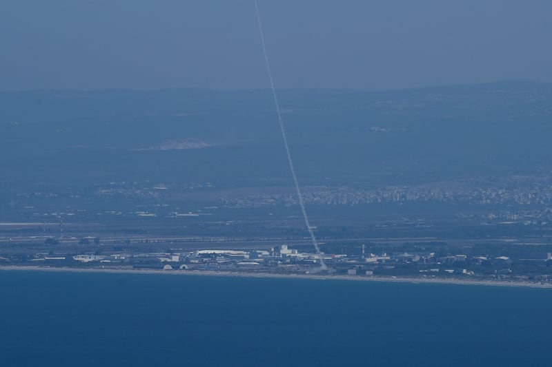 The Israeli Iron Dome air defence system fires to intercept rockets that were launched from Lebanon, as seen from Haifa, northern Israel (Baz Ratner/AP)